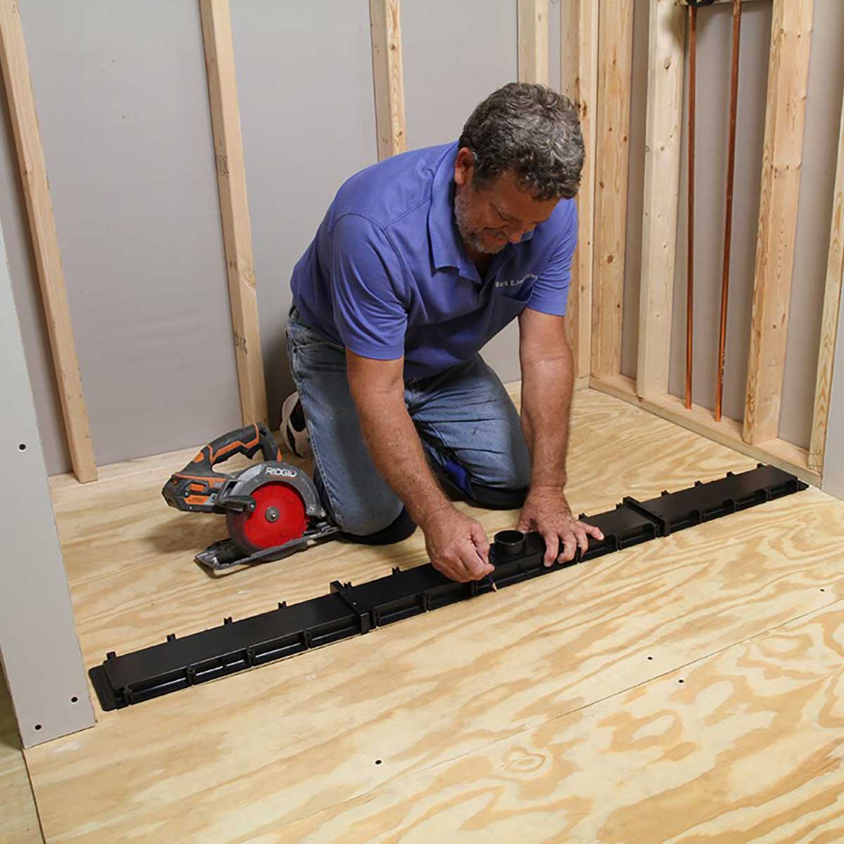 Goof Proof adjustable linear drain system for waterproof bathroom installations
