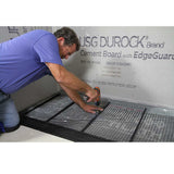 Large format tile shower installation with linear drain system