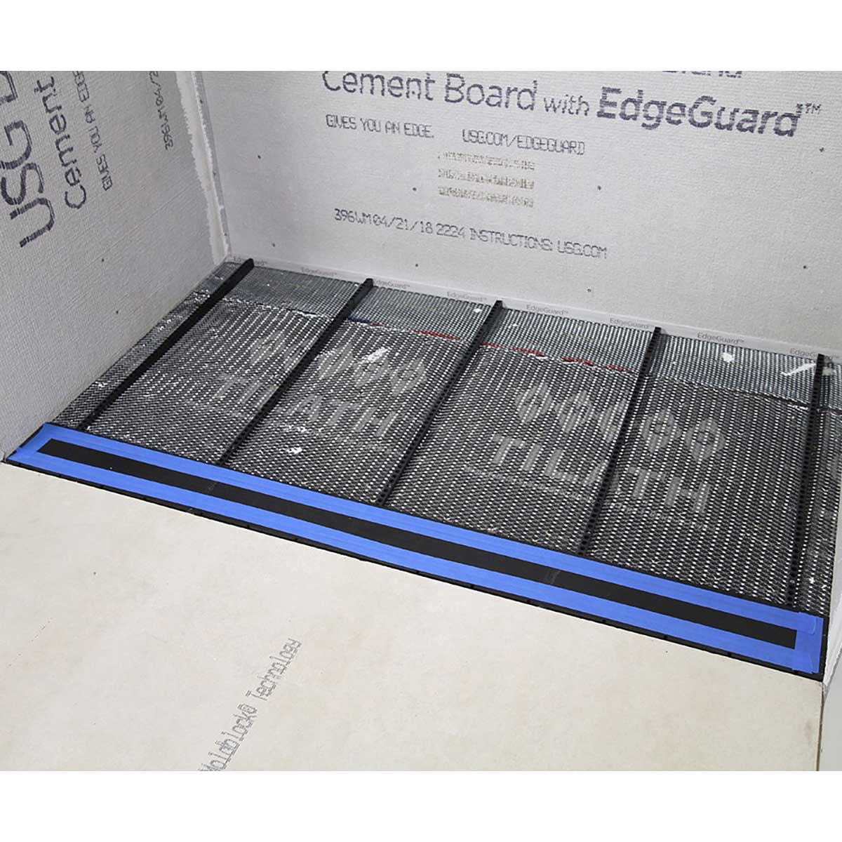Luxury curbless shower installation using adjustable tileable linear drain