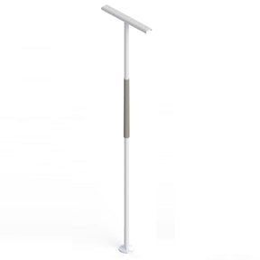Mobility assistance pole with rotating support arm in residential bedroom