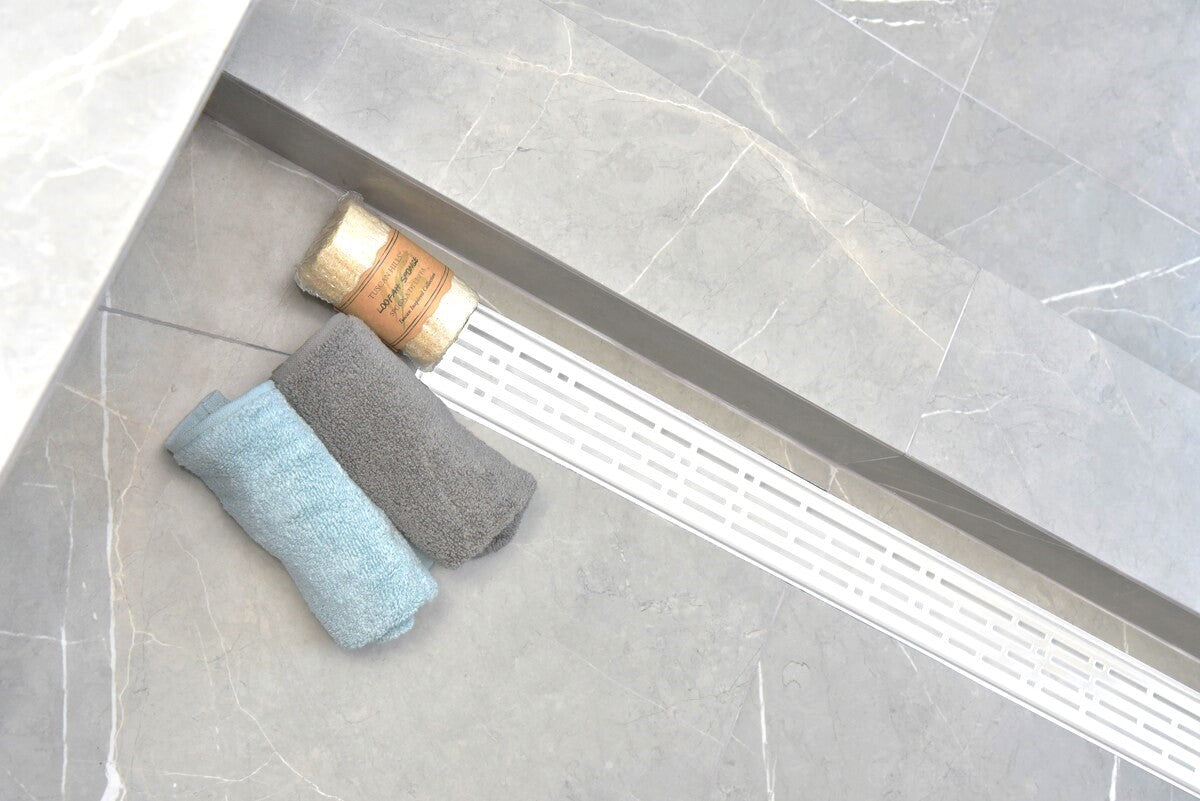 SereneDrains Wow Drain TM Side Discharge Outlet with Linear Shower Drain Horizontal Low Profile