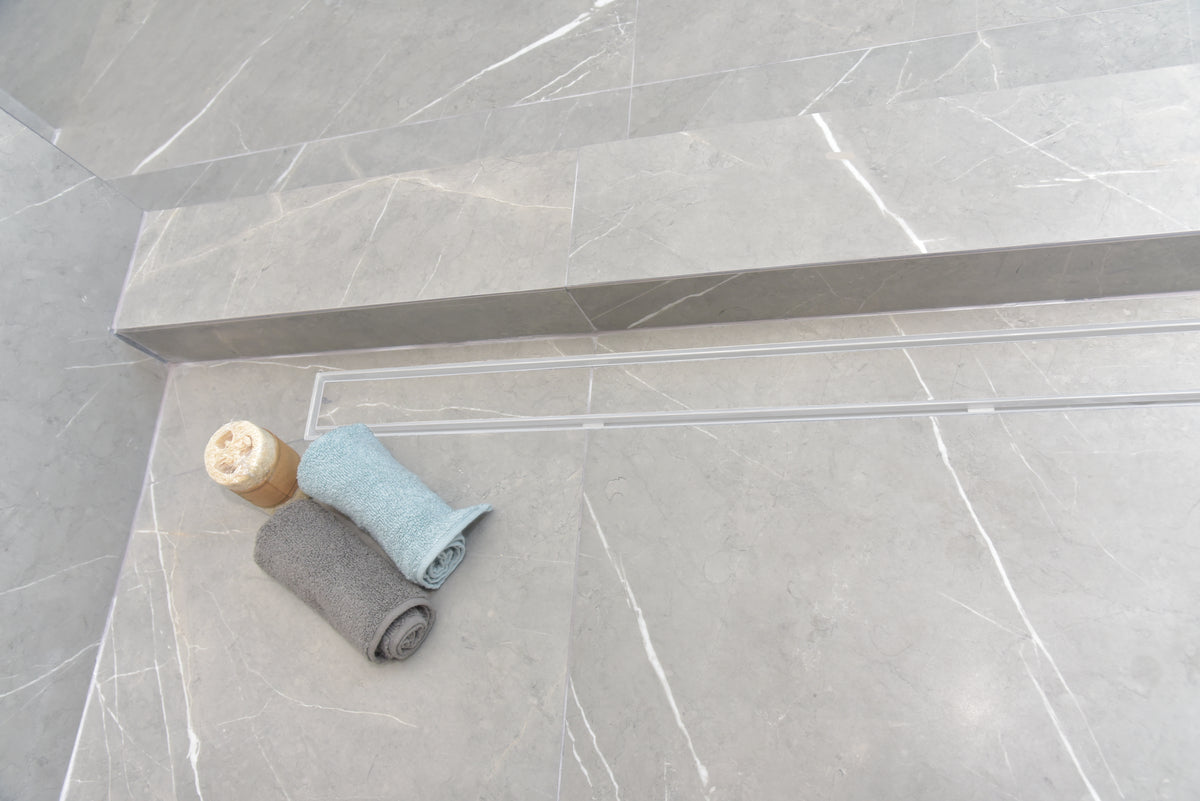 SereneDrains Wow Drain TM Side Discharge Outlet with Tile In Linear Shower Drain Horizontal Low Profile