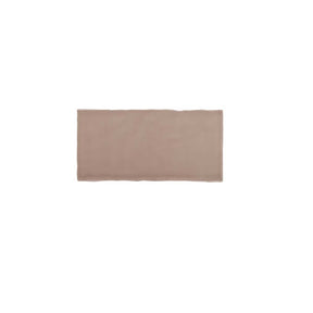 Glossy mocha ceramic subway tile featuring handcrafted Spanish artisan texture