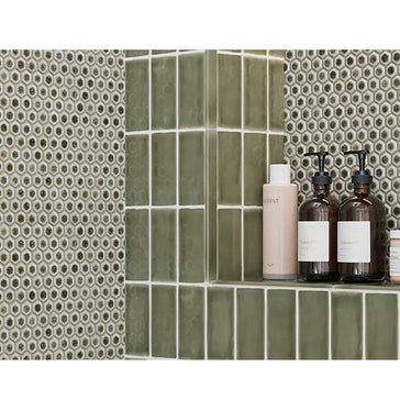 Olive green ceramic backsplash tile bringing natural warmth to a contemporary kitchen