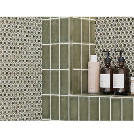 Olive green ceramic backsplash tile bringing natural warmth to a contemporary kitchen