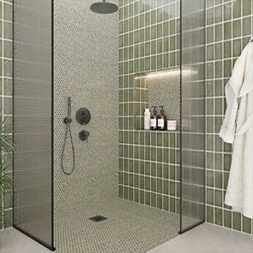 Handmade olive green wall tile creating a sophisticated feature in shower and bathroom spaces