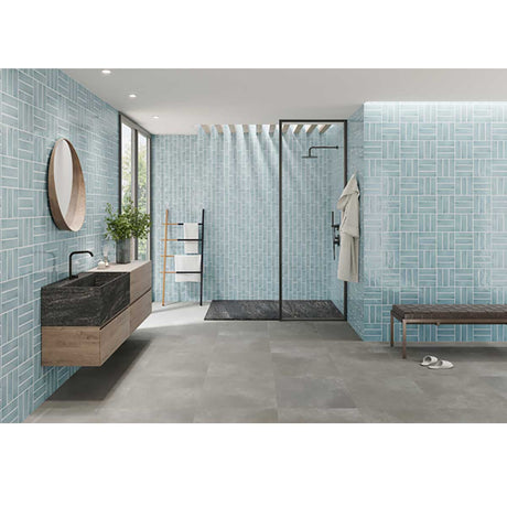 Handmade sky blue wall tile creating a calming feature in shower and bathroom spaces