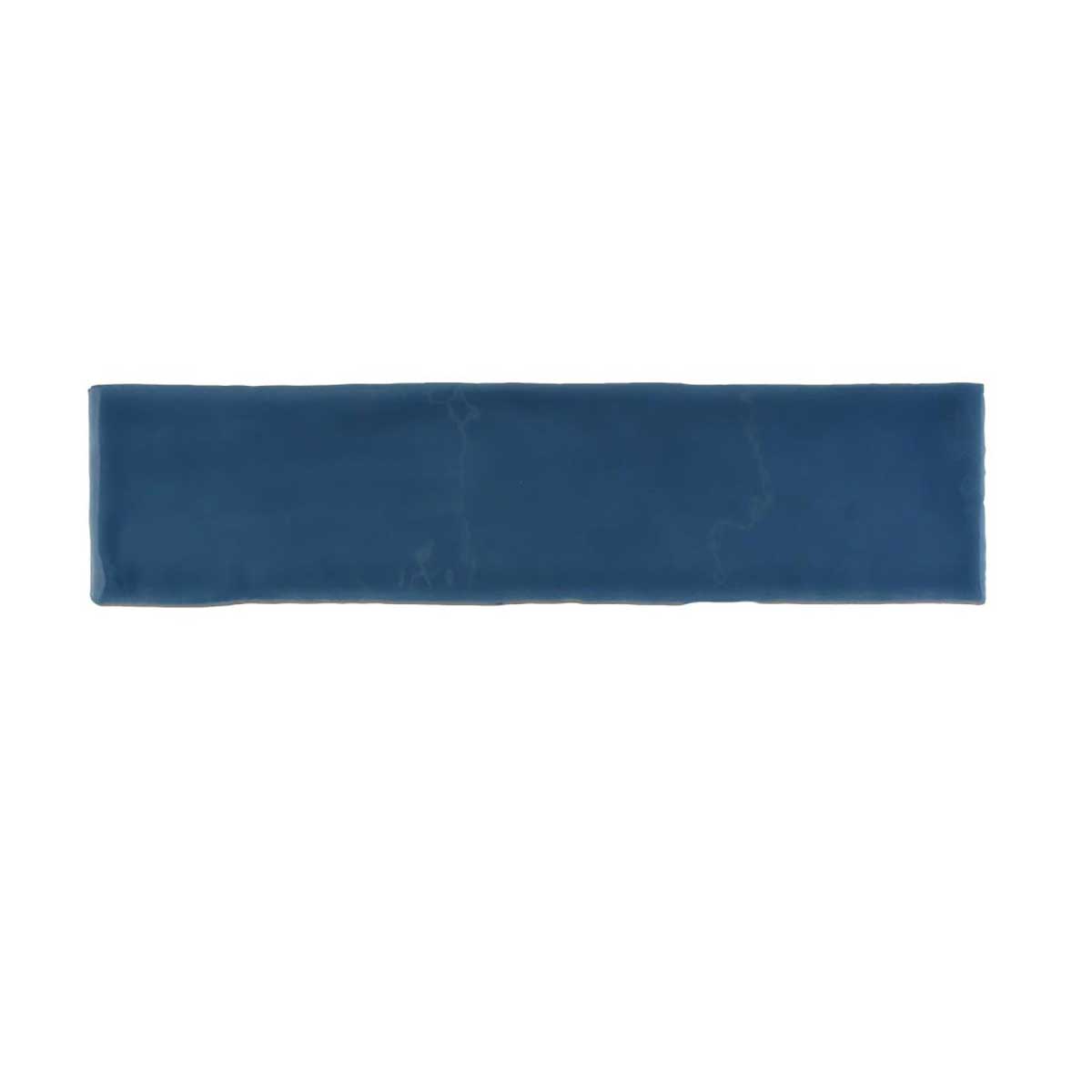 Glossy blue ceramic wall tile with handcrafted Spanish artisan character