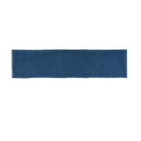 Glossy blue ceramic wall tile with handcrafted Spanish artisan character
