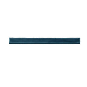 Glossy blue ceramic bullnose trim tile with handcrafted Spanish detailing
