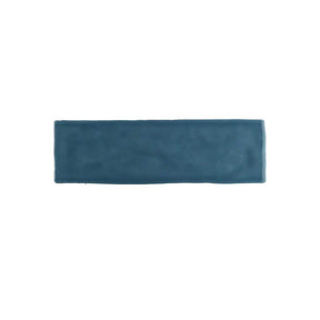Glossy blue ceramic wall tile with handcrafted Spanish artisan detailing