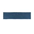 Glossy blue ceramic subway tile with handcrafted Spanish artisan character