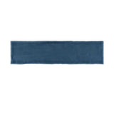 Glossy blue ceramic subway tile with handcrafted Spanish artisan character