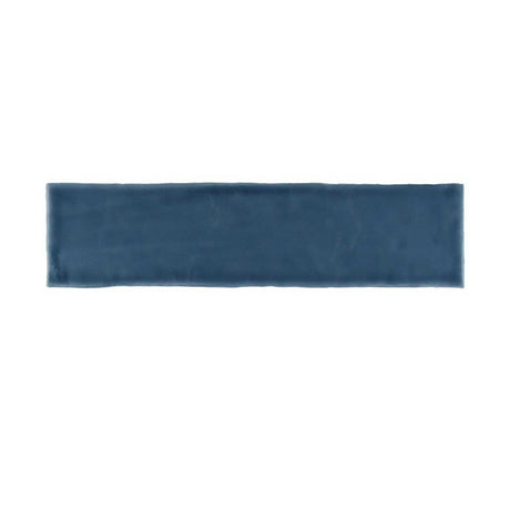 Glossy blue ceramic subway tile with handcrafted Spanish artisan character