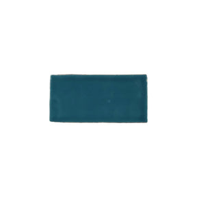 Glossy blue marine ceramic subway tile with handcrafted Spanish artisan texture