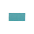 Glossy turquoise blue ceramic subway tile with handcrafted Spanish artisan texture