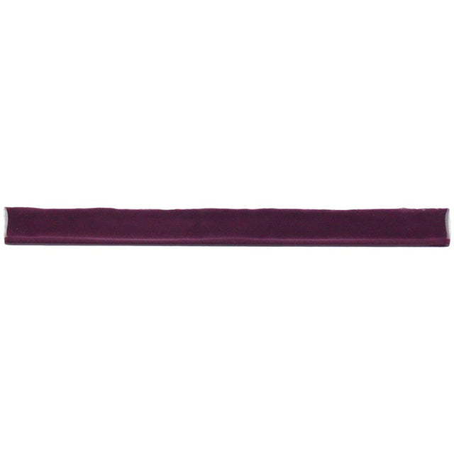 Glossy blueberry ceramic bullnose trim tile with handcrafted Spanish character