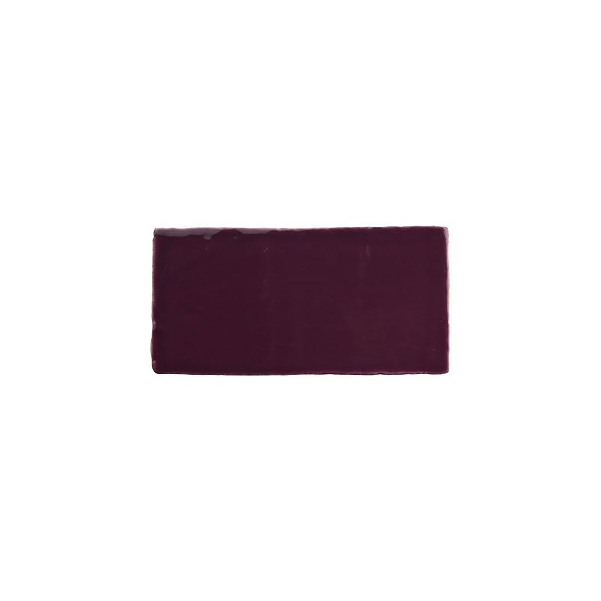 Glossy blueberry ceramic subway tile with handcrafted Spanish artisan detailing