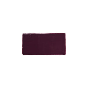 Glossy blueberry ceramic subway tile with handcrafted Spanish artisan detailing