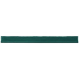 Glossy green ceramic bullnose trim tile with handcrafted Spanish detailing