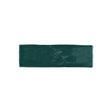 Glossy green ceramic wall tile with artisan-inspired handcrafted texture