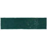 Glossy green ceramic wall tile featuring handcrafted Spanish artistry