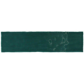 Glossy green ceramic wall tile featuring handcrafted Spanish artistry
