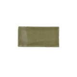 Glossy camel ceramic subway tile featuring handcrafted Spanish artisan character