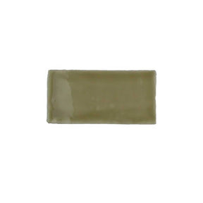 Glossy camel ceramic subway tile featuring handcrafted Spanish artisan character