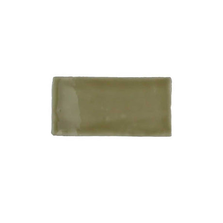Glossy camel ceramic subway tile featuring handcrafted Spanish artisan character