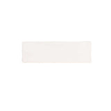 Glossy cream ceramic wall tile with handcrafted Spanish artisan character