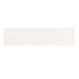 Glossy cream ceramic subway tile with handcrafted Spanish artisan detailing