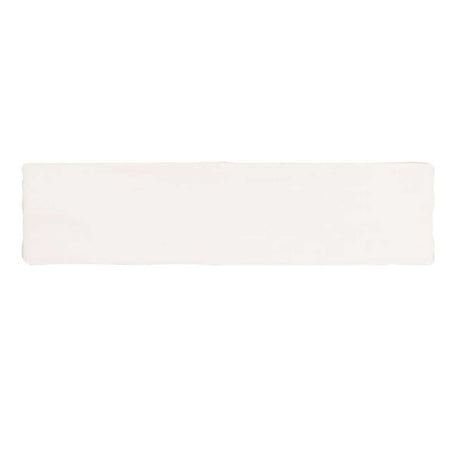 Glossy cream ceramic subway tile with handcrafted Spanish artisan detailing