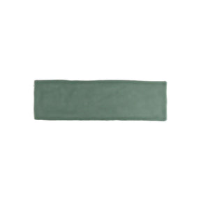 Glossy green ceramic wall tile with handcrafted Spanish artisan character