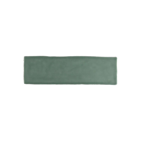 Glossy green ceramic wall tile with handcrafted Spanish artisan character