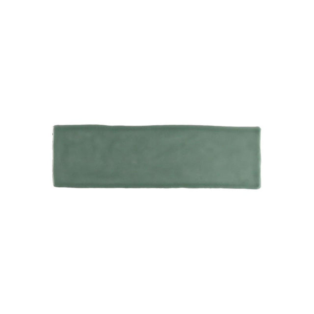 Glossy green ceramic wall tile with handcrafted Spanish artisan character