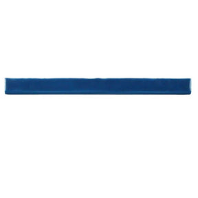 Glossy indigo ceramic bullnose trim tile with handcrafted Spanish artisan detailing