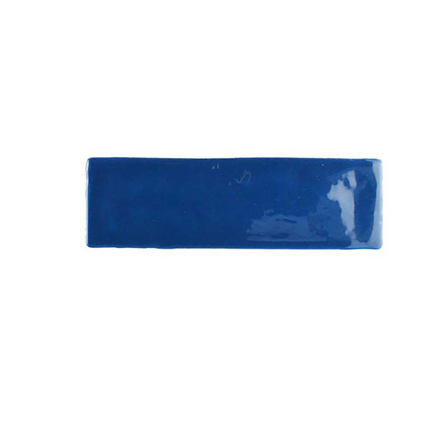 Glossy indigo ceramic wall tile with handcrafted Spanish artisan character