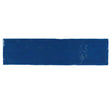 Glossy indigo ceramic subway tile with handcrafted Spanish artisan detailing