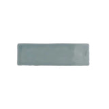 Glossy mint ceramic wall tile with handcrafted Spanish artisan character