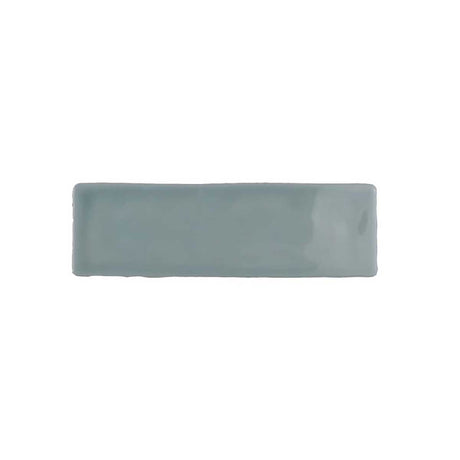 Glossy mint ceramic wall tile with handcrafted Spanish artisan character