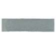 Glossy mint ceramic subway tile with handcrafted Spanish artisan detailing