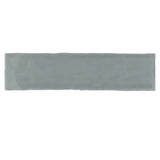 Glossy mint ceramic subway tile with handcrafted Spanish artisan detailing