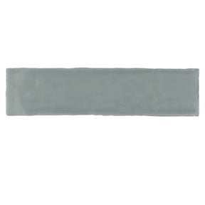 Glossy mint ceramic subway tile with handcrafted Spanish artisan detailing