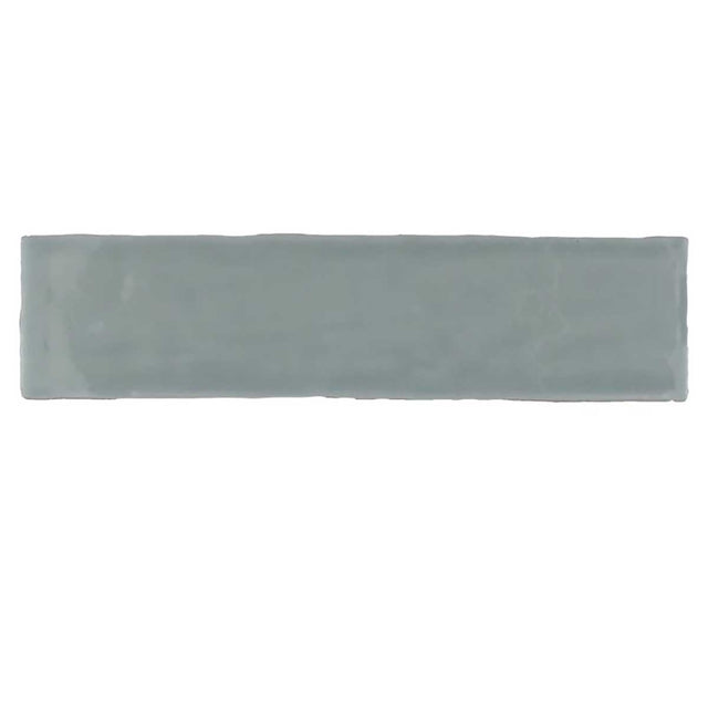 Glossy mint ceramic subway tile with handcrafted Spanish artisan detailing