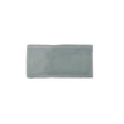 Glossy mint ceramic subway tile featuring handcrafted Spanish artisan texture