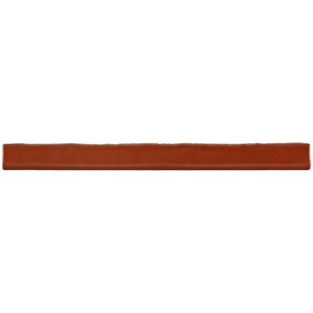 Glossy orange ceramic bullnose trim tile with handcrafted Spanish artisan detailing
