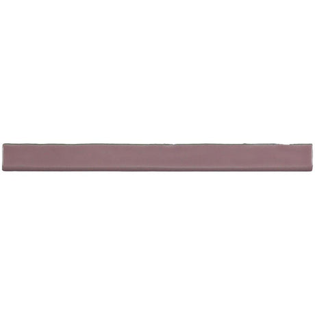 Glossy pink ceramic bullnose trim tile with handcrafted Spanish artisan detailing