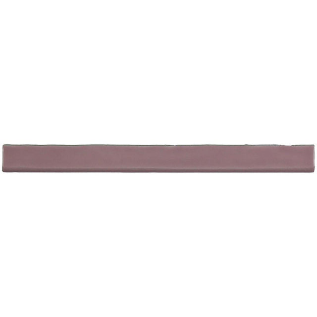 Glossy pink ceramic bullnose trim tile with handcrafted Spanish artisan detailing