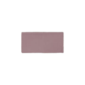 Glossy pink ceramic subway tile with handcrafted Spanish artisan detailing